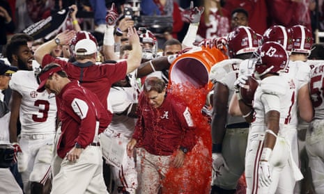 Alabama head coach Nick Saban gets doused after the NCAA college football playoff championship game against Clemson.