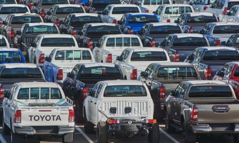 Lines of new Hilux automobiles in a parking lot ahead of distribution at Toyota Motor Corp