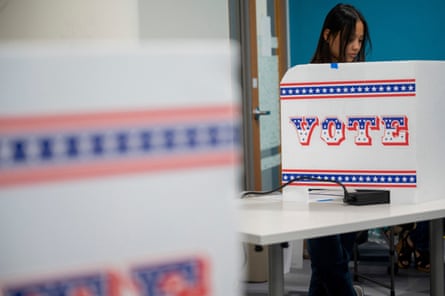 a women at the voting box