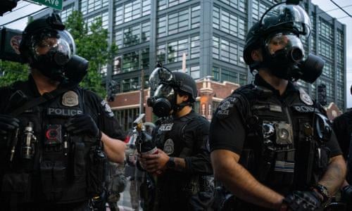 Outrage At Video Showing Child Who Was Maced By Police At Seattle Protest Us News The Guardian