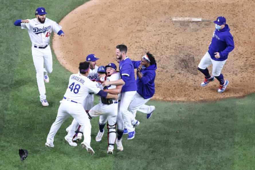 The Los Angeles Dodgers celebrate after beating the Tampa Bay Rays 3-1 to win the 2020 MLB World Series.