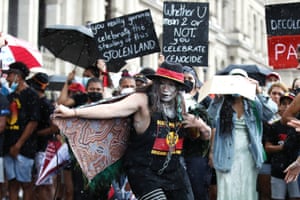 Activists dance during an Invasion Day rally in Brisbane,