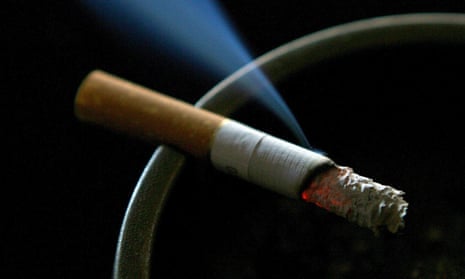 cigarette burning on an ashtray. 