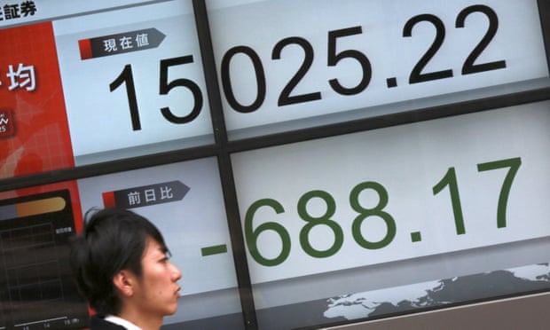 An electronic board showing Japan’s Nikkei 225 in Tokyo on Friday. The bourse could record its worst week since 2008.