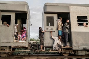 Shinile, Ethiopia: passengers look on after boarding an old train