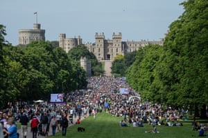 People enjoy the jubilee picnic in the park on the Long Walk at Windsor Great park.