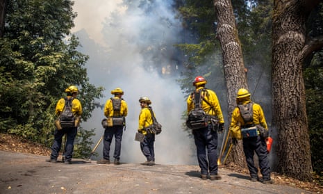 Firefighters in Ben Lomond, California on Sunday.