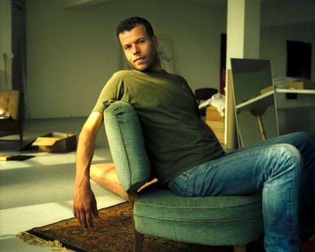 Wolfgang Tillmans reclines in a chair