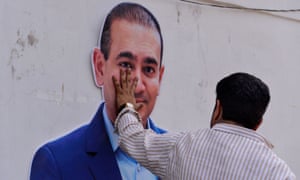 A cardboard cut-out of billionaire jeweller Nirav Modi at a protest against him in New Delhi in February.
