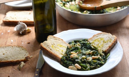 Rachel Roddy’s white beans and wilted greens.
