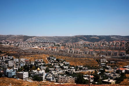 The Palestinian village of Wadi Fukin and the Israeli settlement of Beitar Illit beyond, both in the West Bank.