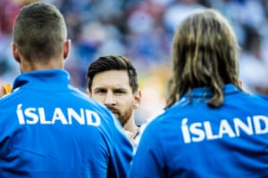 Argentina’s Lionel Messi shakes hands with the Iceland players before the match at Spartak Stadium.