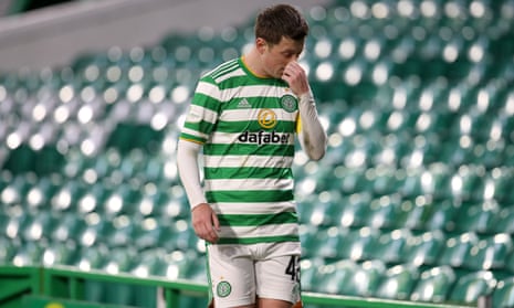 Celtic’s Callum McGregor walks down the touchline after the draw.