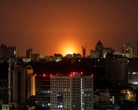 An explosion lights up the sky over the city during a Russian missile and drone strike, amid Russia's attack on Ukraine, in Kyiv, Ukraine.