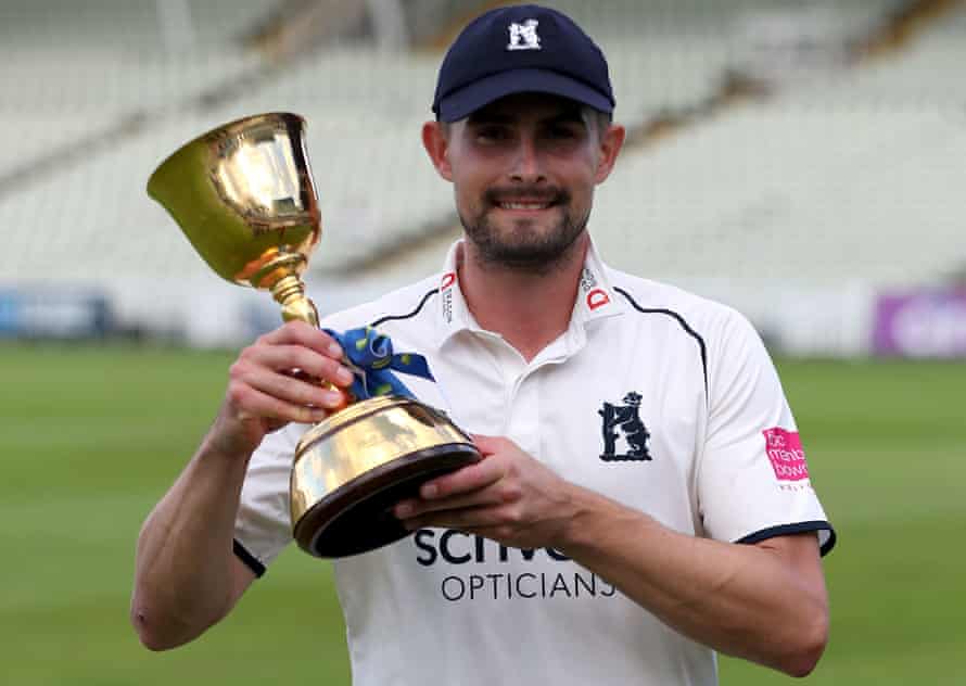 Warwickshire captain Will Rhodes with the County Championship trophy.
