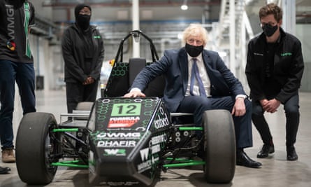Boris Johnson visits Coventry, sits in an electric sports car