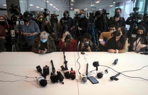 Reporters and camera operators wait for a press conference with Hiram Sanchez, the chief prosecutor for central Baja California, in Tijuana, Mexico, about the murder of Margarito Martínez Esquivel.