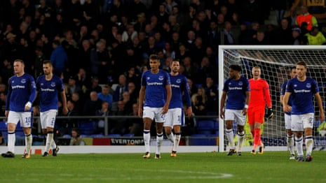 Everton’s players look dejected after losing a goal at such a late stage.