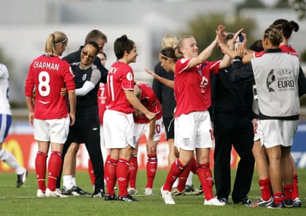 England’s manager Hope Powell (second left) celebrates with her players after their quarter-final victory over Finland.