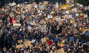 Protesters participate in a Black Lives Matter rally in Brisbane, Australia.