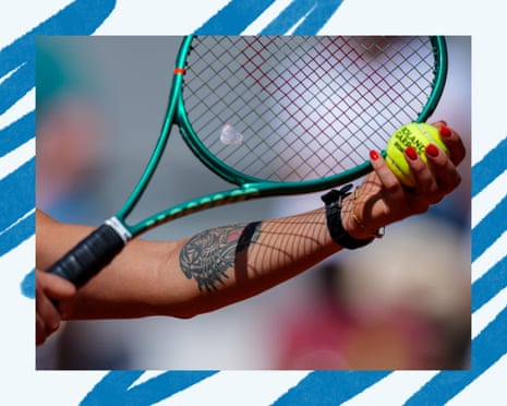Detailed view of the tiger tattoo on the arm of Aryna Sabalenka during a practice session.