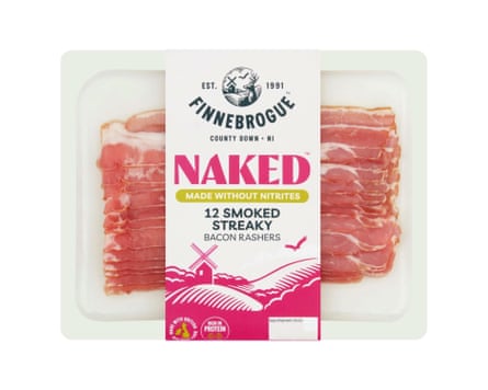 A packet of Finnebrogue Naked 12 Smoked Streaky Bacon. There is a clear back and the rashers are clearly visible with a branded label wrapped around the middle.