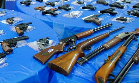 Guns are displayed after a gun buyback event in Queens, New York.