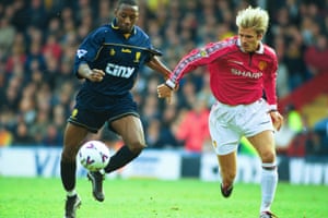 Jason Euell battles with David Beckham during a Wimbledon game against Manchester United in 2000.