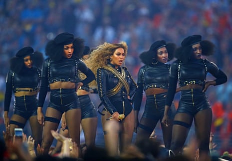 Beyonce performs at halftime with dancers in Super Bowl 50 between the Carolina Panthers and the Denver Broncos