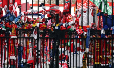Scarves are tied to the Shankly Gates next to the Hillsborough memorial at Anfield.
