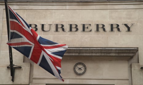 the Burberry store sign with a union flag fluttering nearby