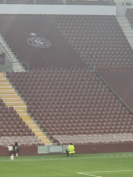 man watching empty seats