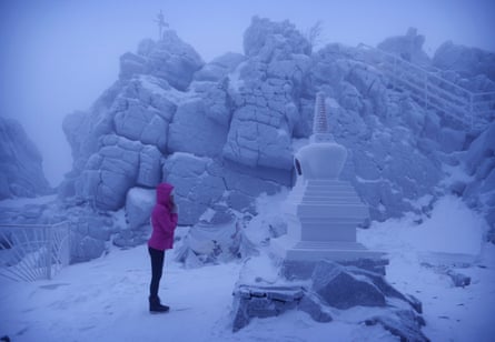 Yulia Gasheva praying at a stupa which is for prayers directed at other people.