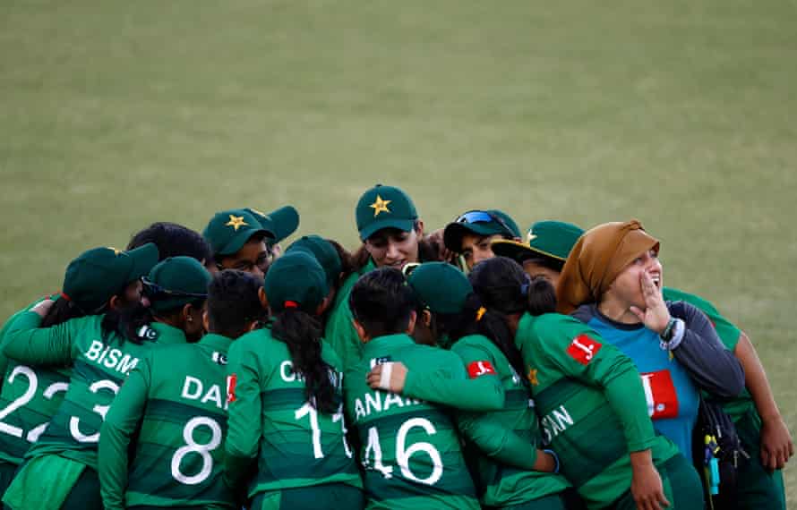 A team huddle during a women’s cricket match