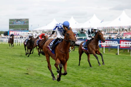 Highwayman ridden by Saffie Osborne on their way to winning the St Leger Stakes at Doncaster