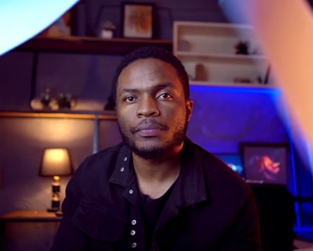 A photo of an African man looking at the camera