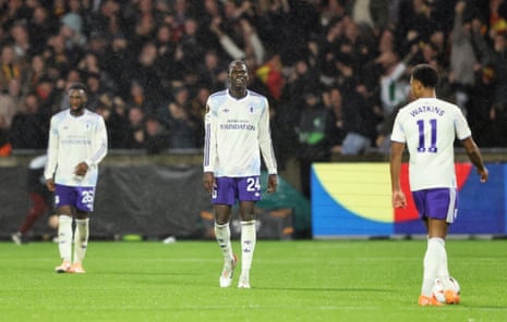 Amadou Onana of Aston Villa reacts after his side conceded a second goal