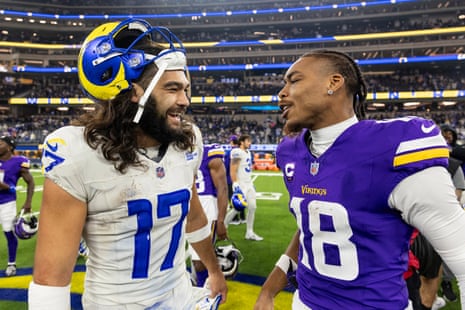 Puka Nacua and Justin Jefferson greet each other after a game in 2024