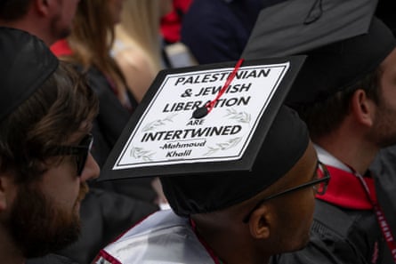a man wearing a graduation cap