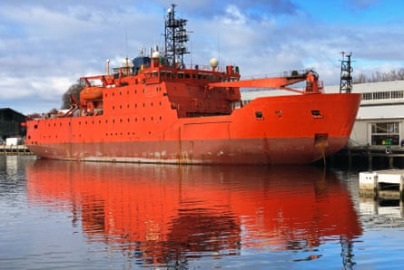 Icebreaker ship the Aurora Australis painted in International Orange, moored in the harbour in Hobart.