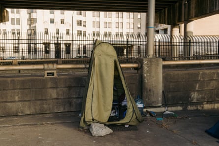 a tent under an overpass