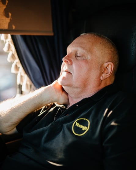 Rob Piper rests his eyes while waiting for a delivery to be unloaded