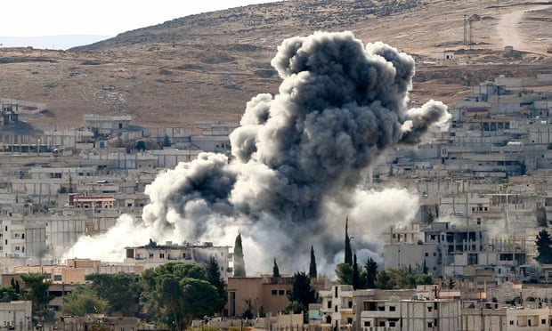 Heavy smoke rises following an airstrike by the US-led coalition aircraft in Kobani, Syria.