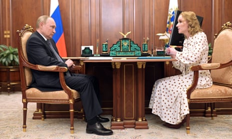 Vladimir Putin meets and Maria Lvova-Belova at the Kremlin in Moscow in March.