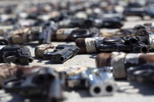Hundreds of firearms, obtained through seizures and from citizens during Mexico’s firearm exchange program, are on display.