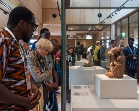 Guests view artworks during a preview event at the Museum of West African Art in Benin City on Sunday.