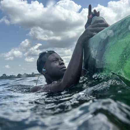 Yvette Tetteh swims in Volta River, Ghana