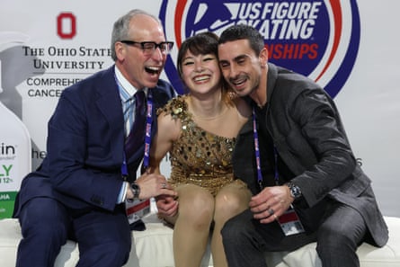 Liu reacts in the Kiss & Cry with her coaches Phillip DiGuglielmo and Massimo Scali at January’s US nationals in Wichita.