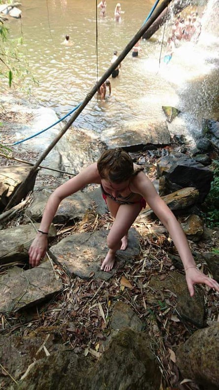 Natalie Cook climbing the waterfall