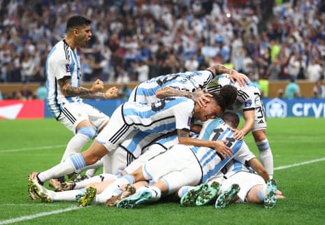 Argentina v France: 2022 World Cup final – live | World Cup 2022 9 Lionel Messi is jumped by his teammates after putting Argentina ahead.